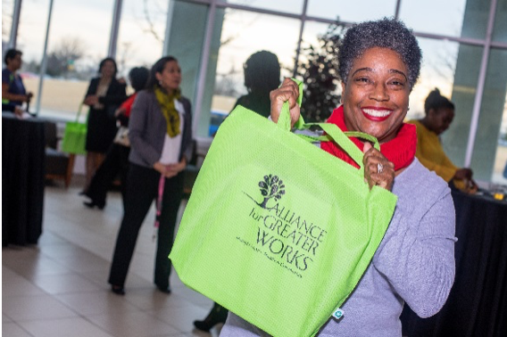 Rosalind Rayford has just received her book bag of program materials and looks ready for the challenge.